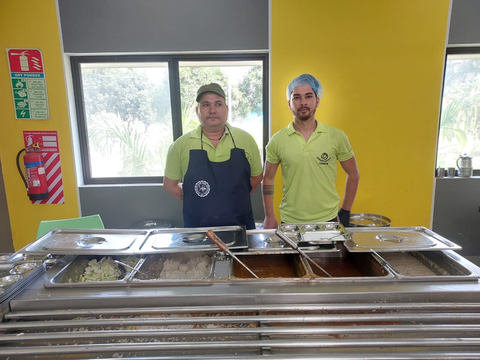 RJ Divine Foods food-service team at a canteen counter