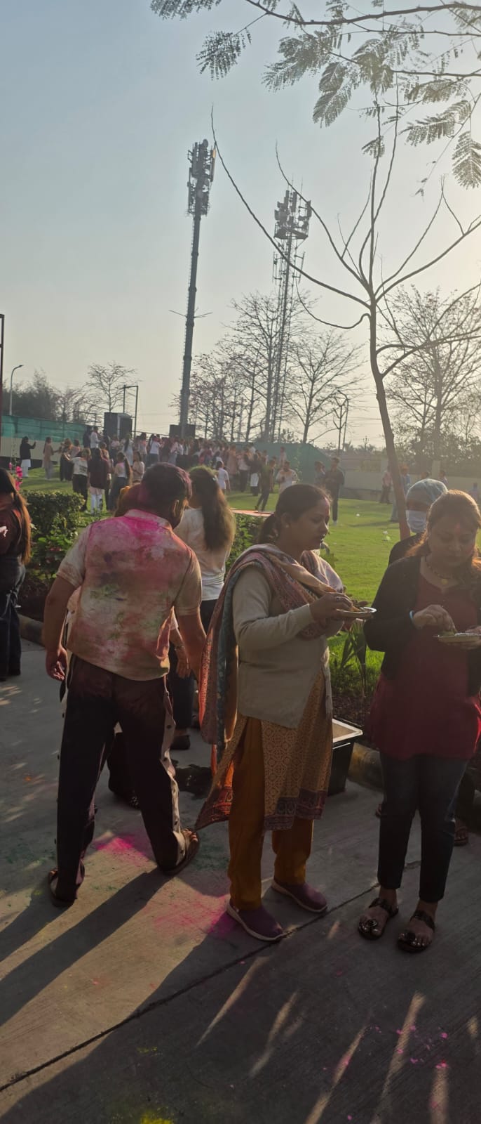 Titan Company · Holi festival photograph by RJ Divine Foods